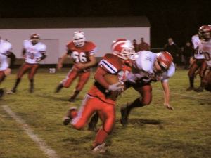 Matt Kistler running the ball at the Fulton game