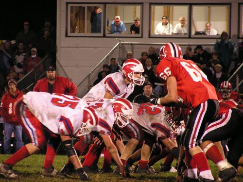 Quarterback Casey Tiesman about to snap the ball