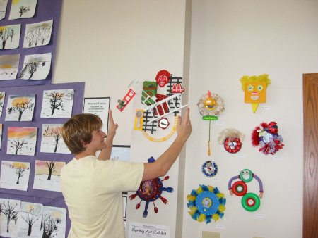 Taylor Boyles adjusting his plastic sculpture