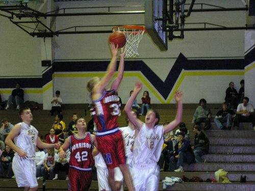 Casey Tiesman going up for a layup in traffic